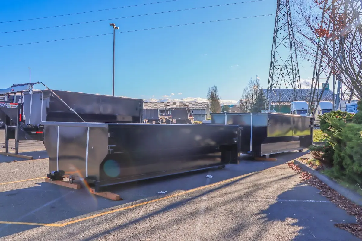Roll-off dumpster ready for waste disposal at job site for Demolition Dumpster Rental in Phelps